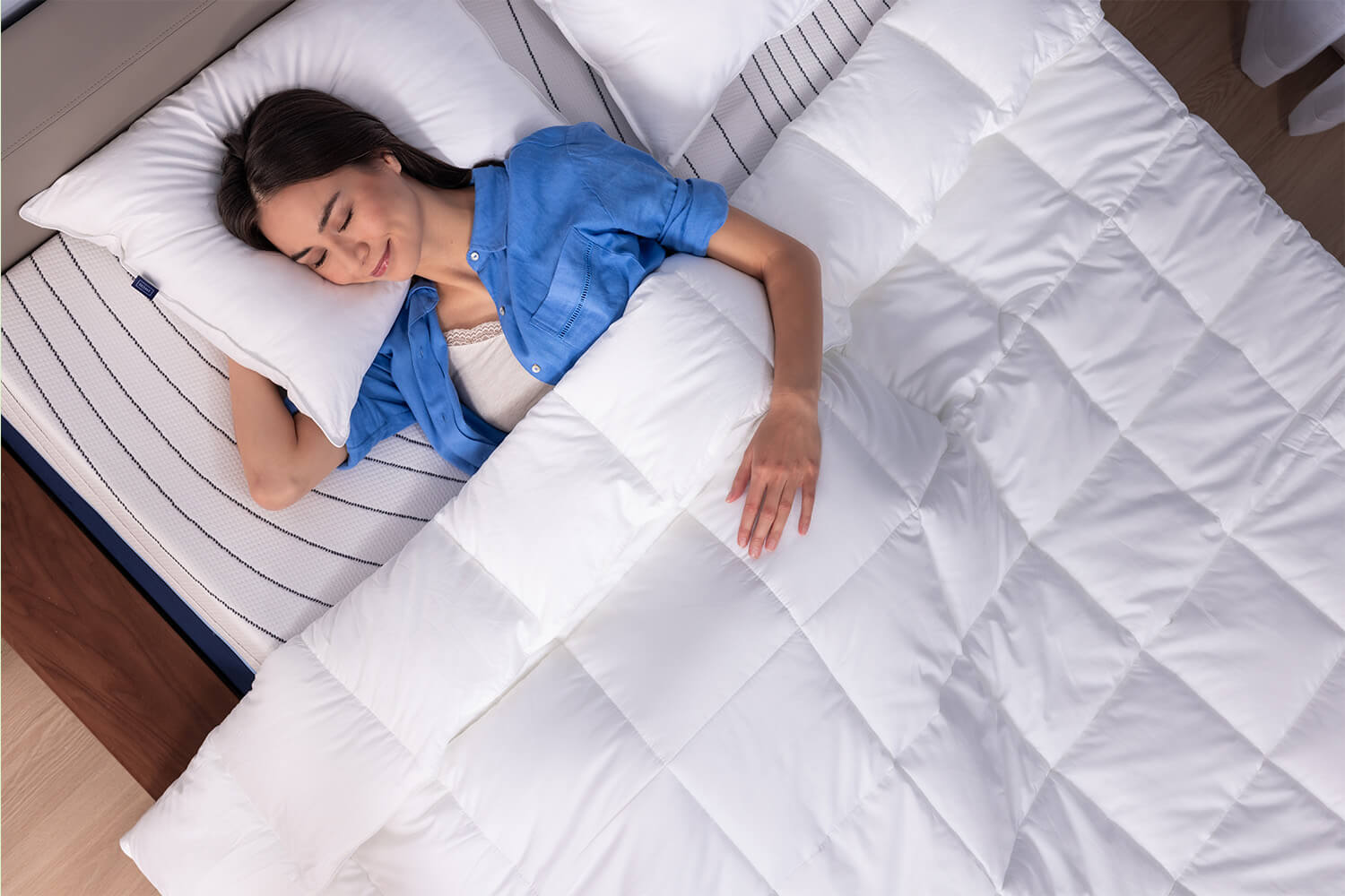 Woman sleeping peacefully with a Octave Down Alternative Duvet