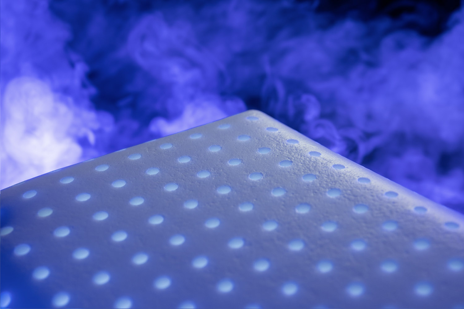 Stylized graphic of the aerated latex foam layer found on Octave Mirage and Horizon mattresses.